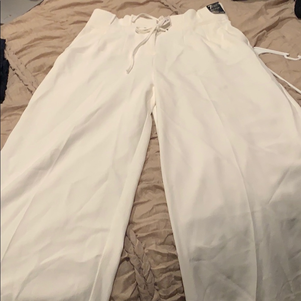 Creamy white wide leg pants